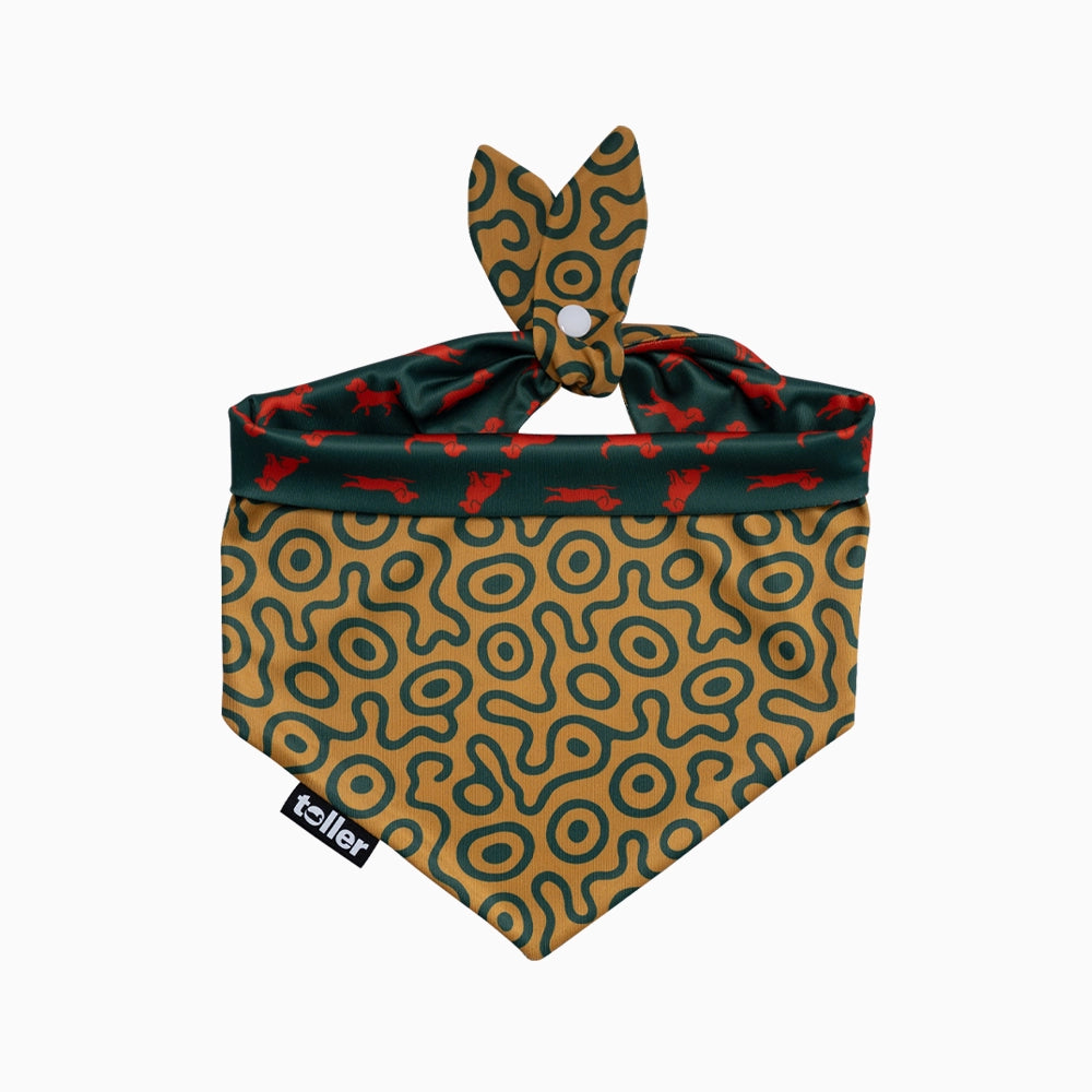 Dog bandana with geometric pattern and complementing print on white background