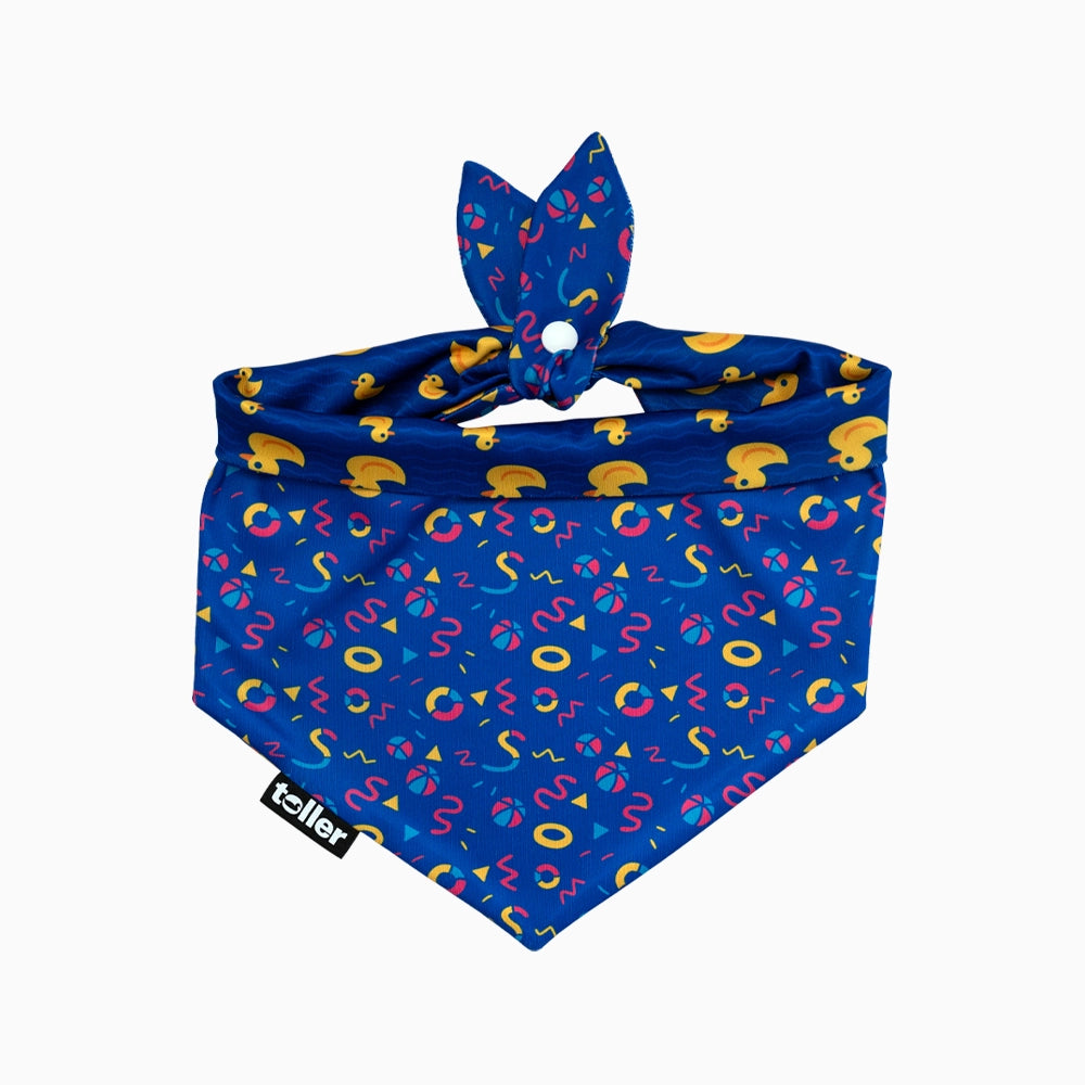 Blue bandana with colorful patterns and matching duck print on a white background
