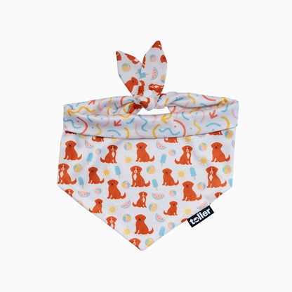 Dog bandana with colorful puppy pattern on a white background