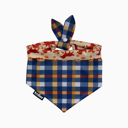Dog bandana with plaid pattern and floral inner layer on a white background