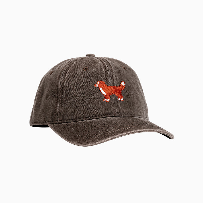 Brown cap with a dog illustration on a white background