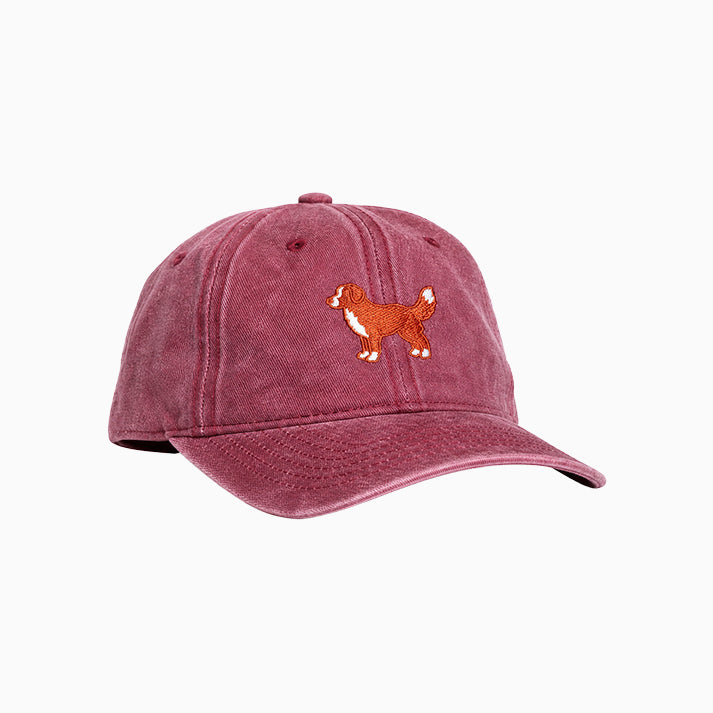 Red cap with a dog illustration on a white background